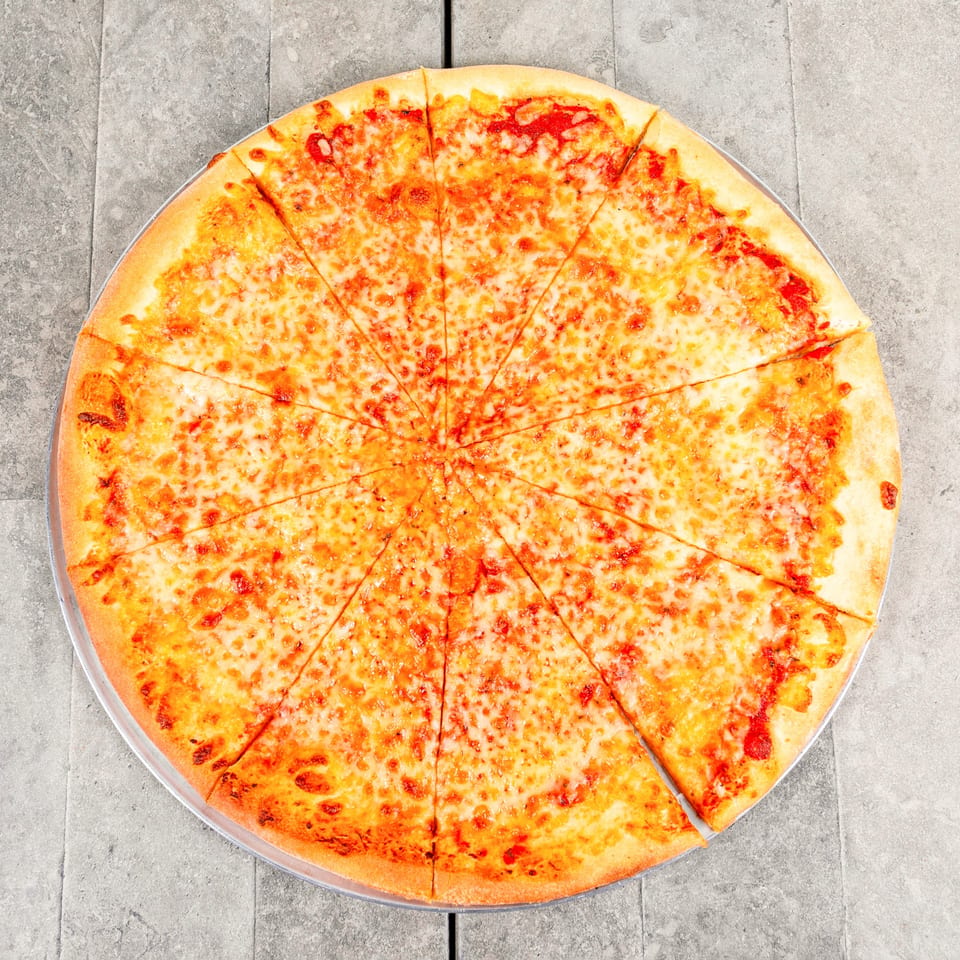 A large, round cheese pizza with a golden crust, cut into many slices on a metal tray.